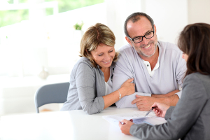 Senior-couple-signing-financia-33875234-300x200 Insurance Products