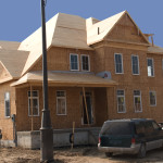 House being built from wood frame. No outside siding placed or roofing material on home yet