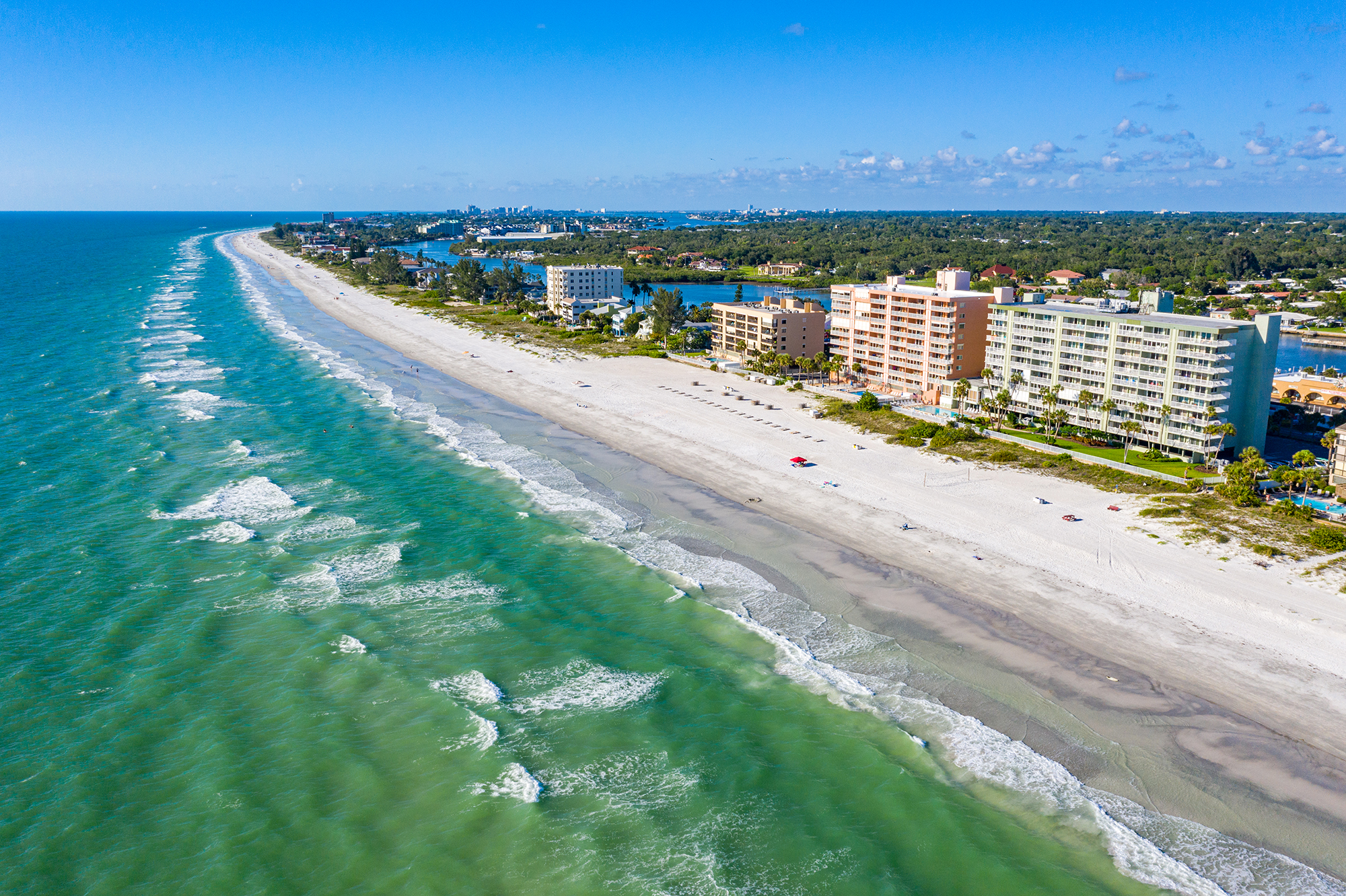indian-shores-sand-castle-condos-aerial-gulf-front-beach Sandbars To Sunsets Team with Future Home Realty Indian Shores Gulf-Front Condo Market Reports 14-Day Median DOM and $1,035,000 Median Price as Tourism Surpasses 2023 Levels