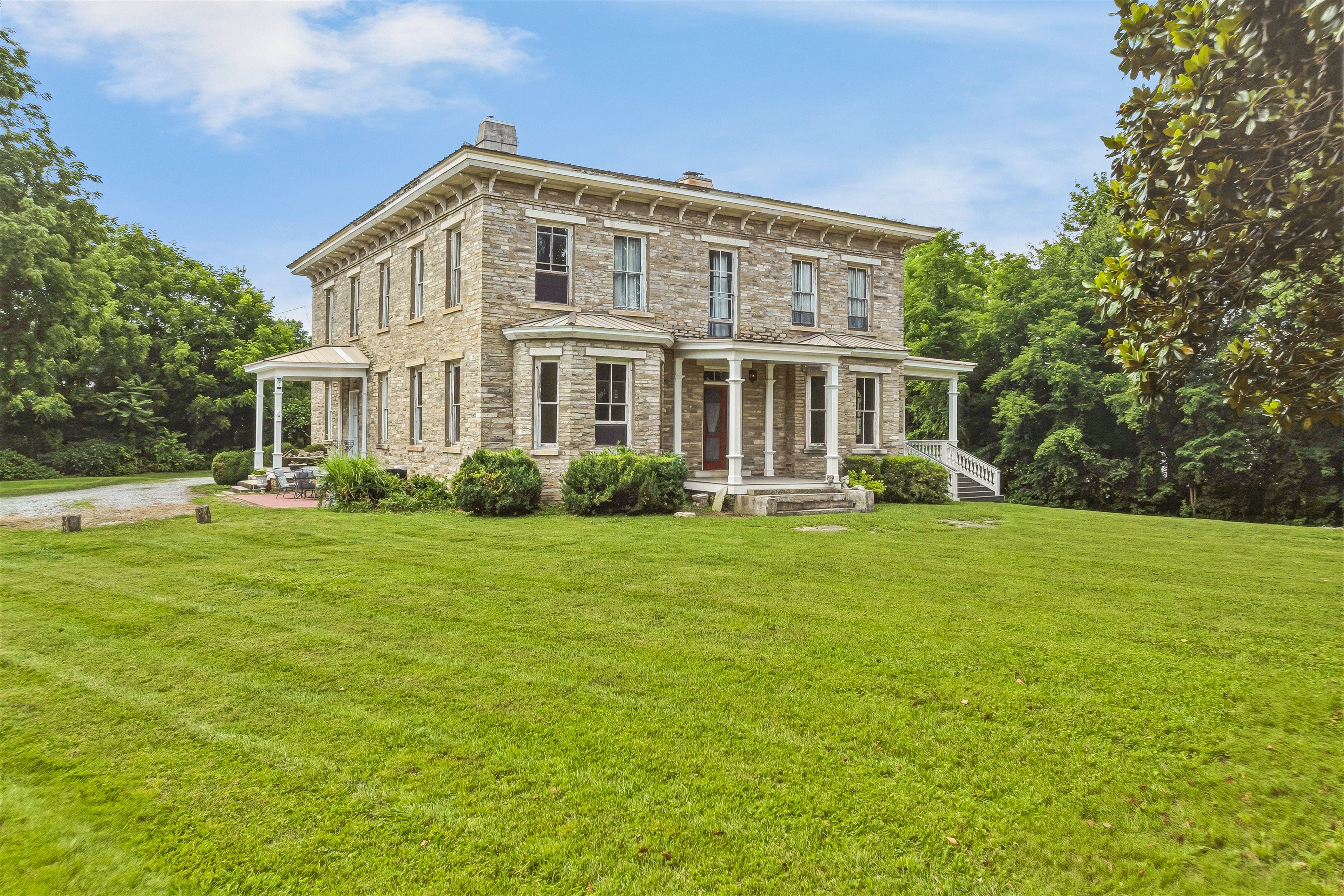 1 Fletcher Grew Around This 1860s Home. Now It’s for Sale for $750K