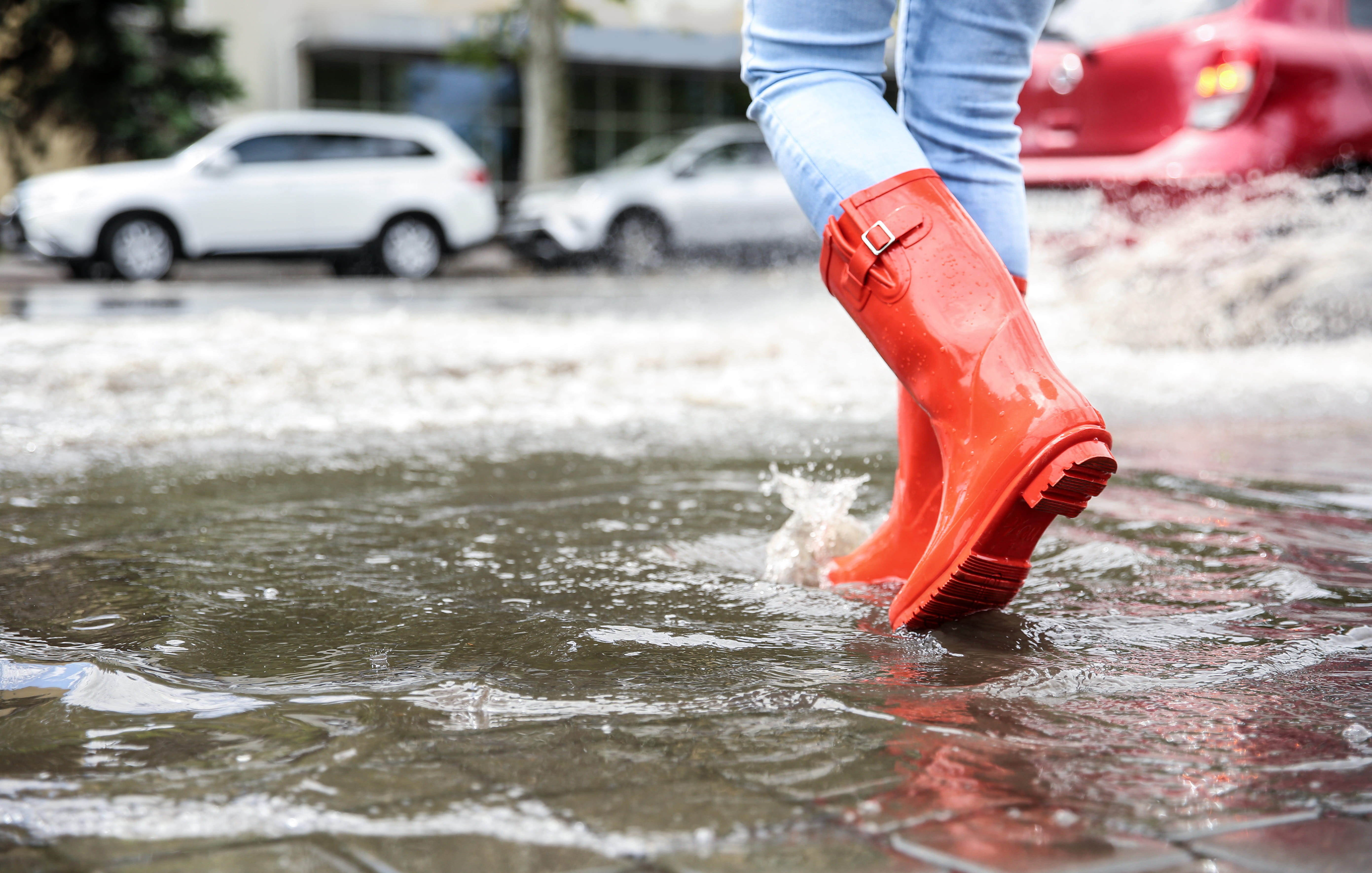 bright-red-boots-splashing-through-flooded-urban-s-2026-09-25-02-02-06-utc-28129 Republic Claims Associates, a Leading Public Adjuster in Monmouth County NJ, Opens Nor'easter Claim Help for Flooded Homes and Businesses